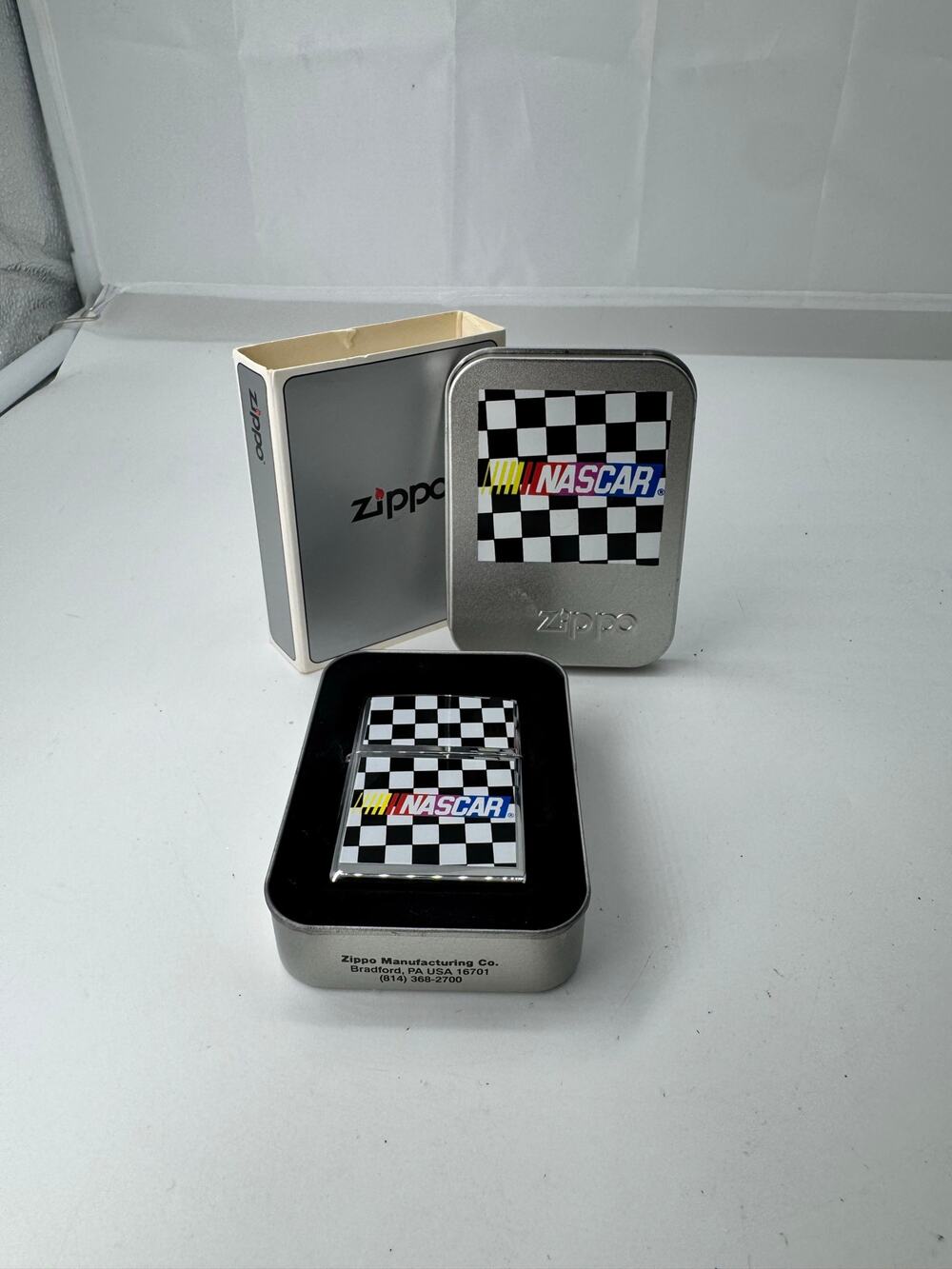 2000 Zippo lighter checkered flag chrome - brand new seal unbroken